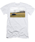 1 Car with the Traveler Stands on the Roadside in a Yellow Field in Zabljak in Montenegro Elena Saulich T-Shirt