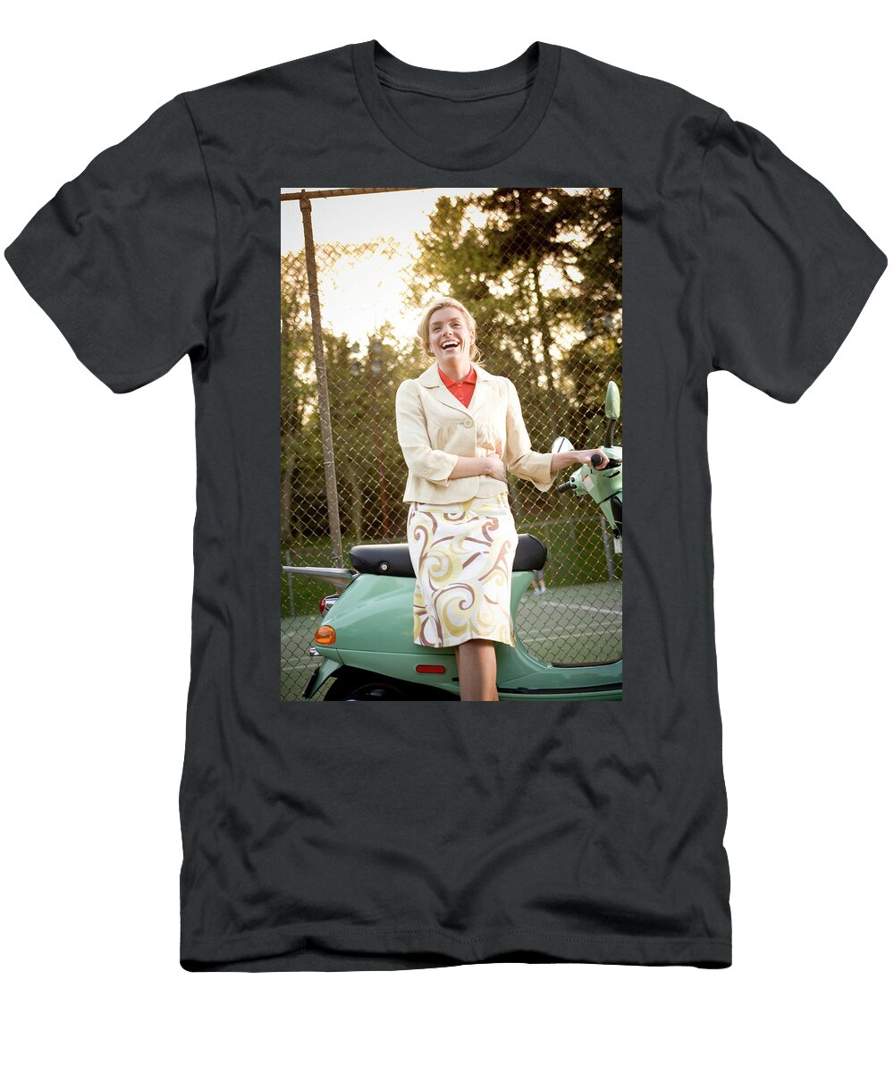 A Young Blonde Woman Wearing Stylish Christopher Cumming T-Shirt