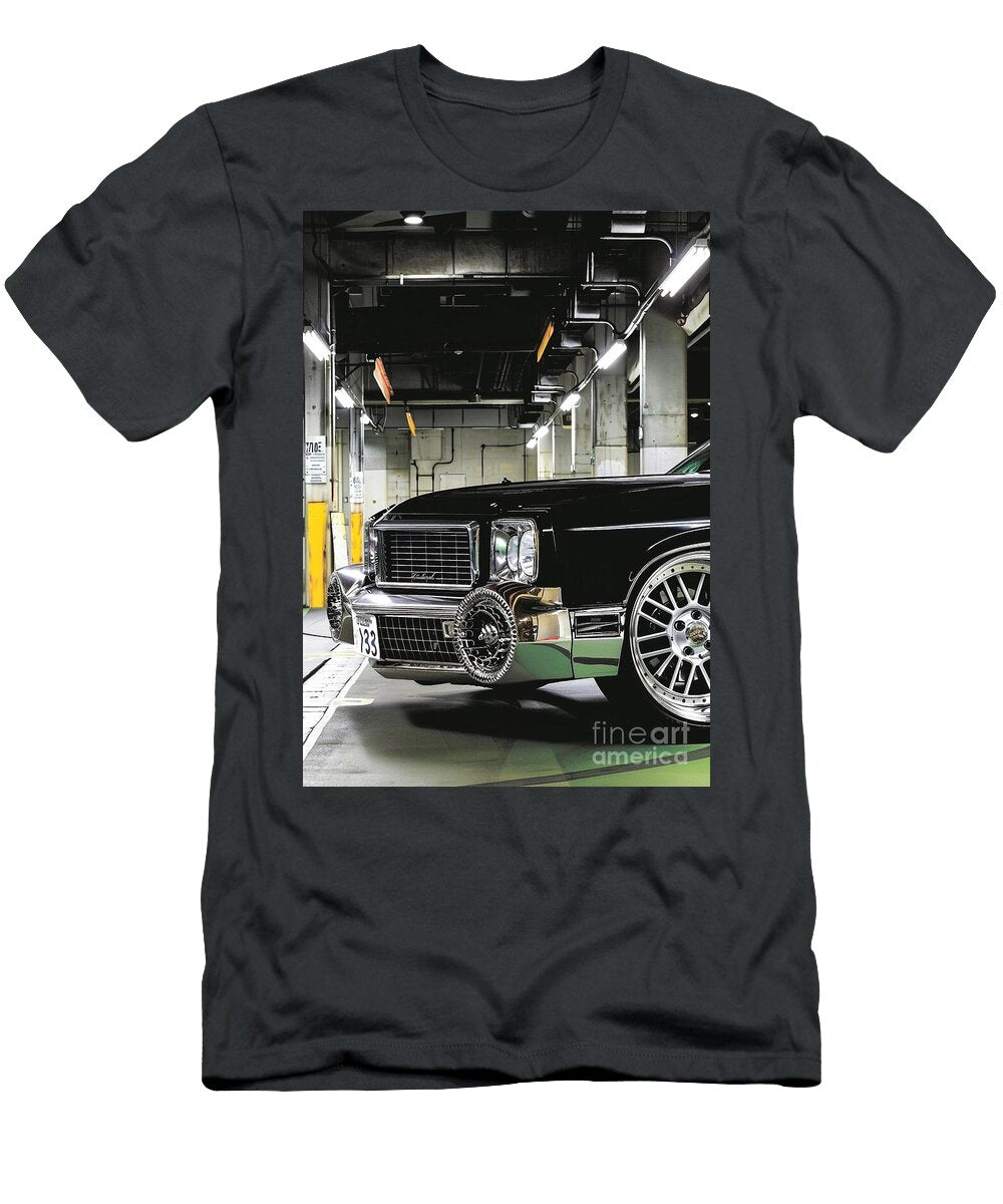 Classic Black Oldsmobile Achieva Car in a Parking Garage Lowell Harann T-Shirt
